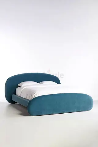 Blue upholstered double bed frame with rounded headboard and footboard