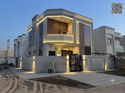 Luxury villa for sale in Al Yasmin with a modern design and high-end finishes, including air conditioning, and ready for immediate occupancy.
