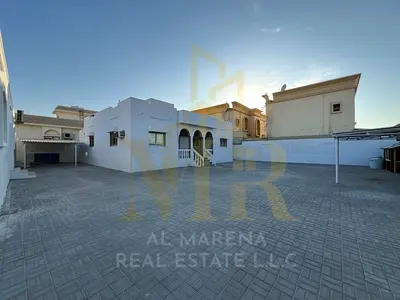 Villa in Rawda 2, 10,000 sq ft, strategically located near Sheikh Ammar Street, price includes electricity, water, and air conditioning.