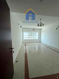 Two bedrooms and a living room for sale with a distinctive rear view