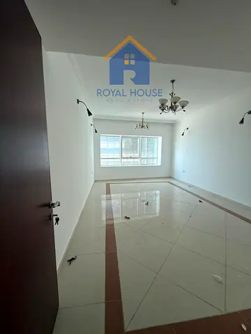 Two bedrooms and a living room for sale with a distinctive rear view