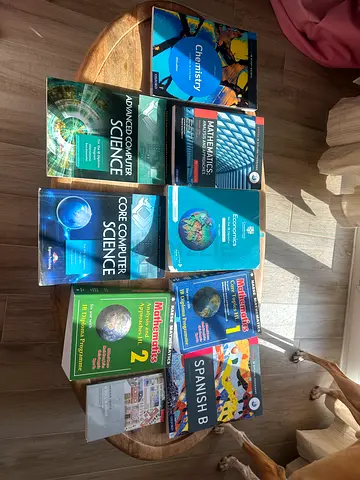 Lot of IB / A-Level textbooks: Chemistry, Mathematics, Economics, Computer Science, Spanish