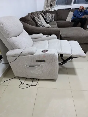 Light grey electric reclining armchair with cup holder and USB
