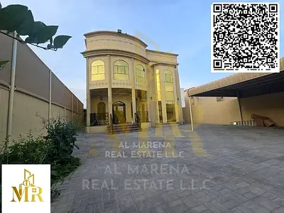 Modern villa for sale in Al Muwaihat 1 area, Ajman. Two floors plus a roof terrace. Excellent location opposite a park and mosque. Price includes elec