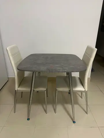 Compact 4-Seater Dining Table with Cream Chairs