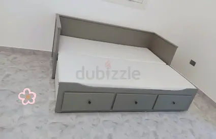 IKEA Hamnes day bed with 3 big storage drawers underneath and with 2 IKEA mattresses