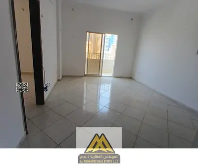 Annual rent: 1BR apartment in Al Rashidiya 3, Ajman. Balcony, closed kitchen, wardrobes, central AC