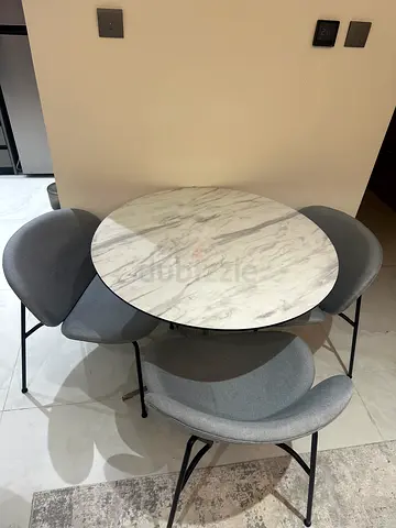 Round Marble-Top Dining Table with 4 Grey Fabric Chairs
