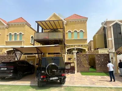 With an all-inclusive price for electricity, water, and air conditioning, own a luxurious villa for sale in Al Rawda 3 - Ajman | 5 master bedrooms | 5