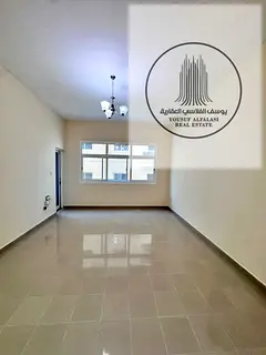 Two-bedroom apartment with a living room for annual rent in Al Rashidiya 3 | Central air conditionin
