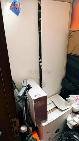 White Sliding Door Wardrobe / Closet (2-door) - Good Condition original price was 495dhs brown sides