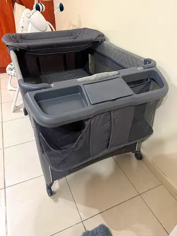 Jikel Gray Portable Bassinet/Playard with Changing Table and Storage