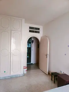 Furnished Room with separate Washroom in Family Building for couple or Executive Bachelor