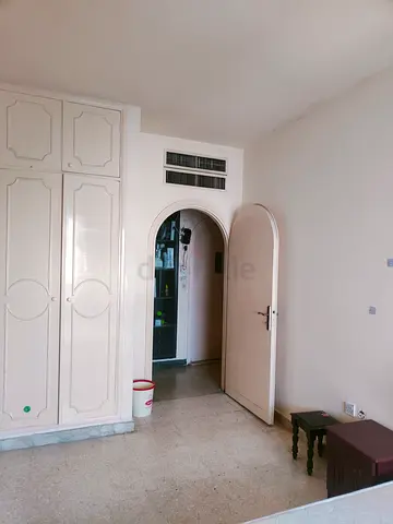 Furnished Room with separate Washroom in Family Building for couple or Executive Bachelor