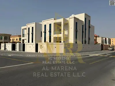 | Own a luxurious residential and investment villa in Al Rawda 3, Ajman. Corner unit, two floors plus a roof terrace. Central air conditioning, elevat