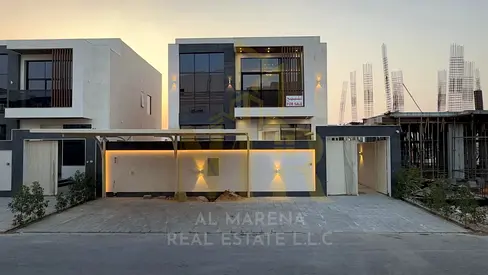 Villa for sale in Ajman | Al Helio 2 area | 4 bedrooms, majlis, 2 living rooms, and maid's room | Freehold for all nationalities | Price includes regi