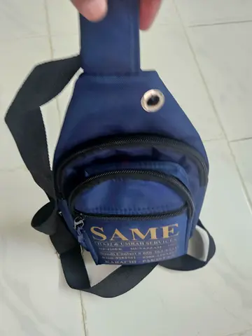 Free Navy compact sling crossbody bag - single strap, good condition