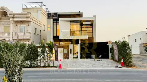 Corner Villa: An exceptional opportunity to own a luxurious modern villa in Al Rawda 3, Ajman. This villa for sale boasts a sophisticated, modern desi