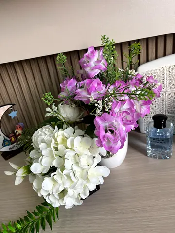 Artificial floral arrangement with white vase - good condition