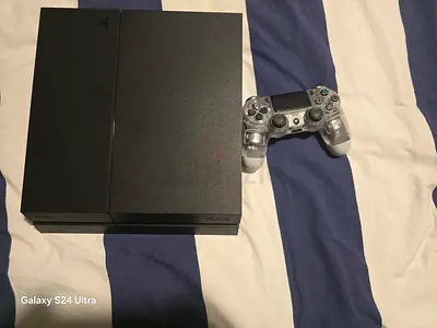 PlayStation 4 console with DualShock 4 controller - used, good condition