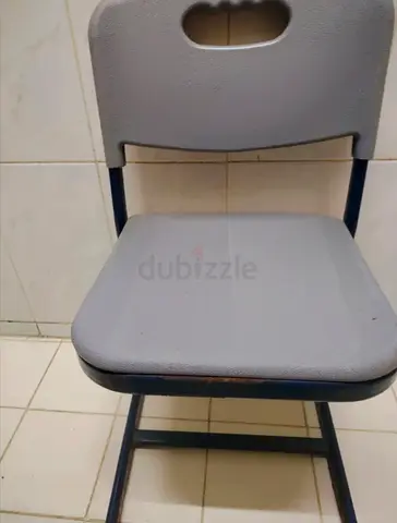 Grey Plastic Chair — Sturdy and Compact