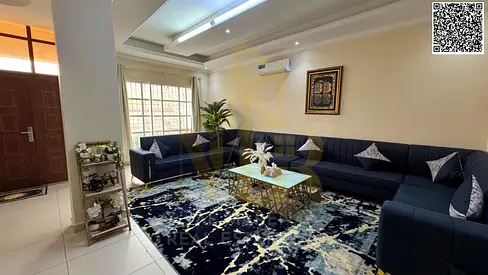 Elegant two-story villa with a roof in Al Muwaihat 1, priced inclusive of services.
