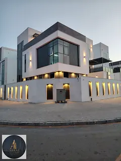 A villa featuring a modern design and spacious indoor and outdoor areas, complete with a swimming po