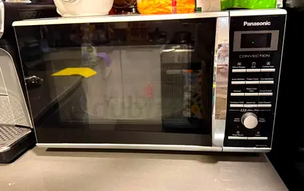 Moving Out Sale!Panasonic Microwave + Convection available for Sale in Ajman (27L)