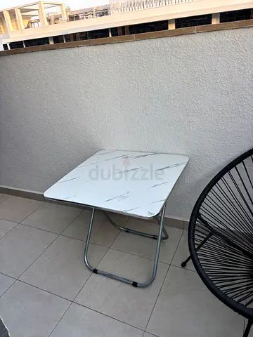 Compact foldable coffee/side table with white marble-effect top