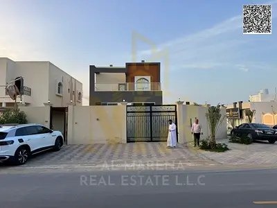 Corner villa, freehold, in one of Ajman's most prestigious areas, on a main street, price includes electricity, water, and air conditioning.