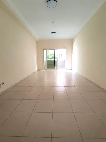 Annual Rent – Al Khan, Sharjah A spacious apartment featuring two master bedrooms and a large living room with a balcony offering an open view. Desig