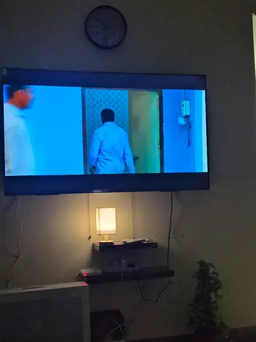 65 LED TV - Good condition, wall-mounted