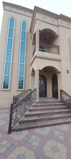 For rent in Al Muwaihat 1, Ajman: A mixed-use (residential/commercial) villa featuring 8 rooms, a li