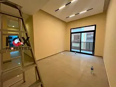 Annual rental in Muwaihat 3 near Dubai exit. 2 master bedrooms, hall, 3 baths, balcony, central AC,