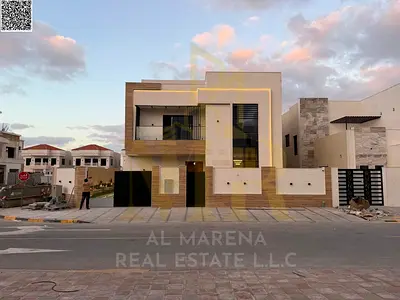 Luxury corner villa for sale in Al Zahia, Ajman | Two floors + roof | Land area 4,050 sq ft | Built-up area 4,000 sq ft | 5 master bedrooms | Majlis a