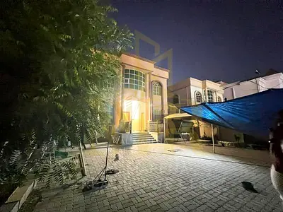 Luxury villa for sale in Al Rawda 2, Ajman – 5000 sq ft, priced at AED 1,450,000 including electricity, water, and air conditioning.