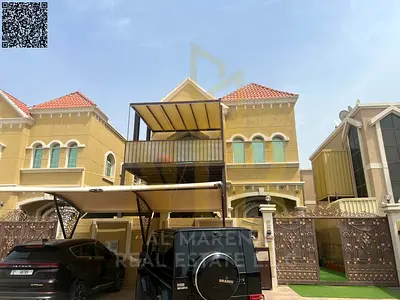 A villa with all electricity, water and air conditioning fees included, on the main street, ready to move in, in the most prestigious areas of Ajman.