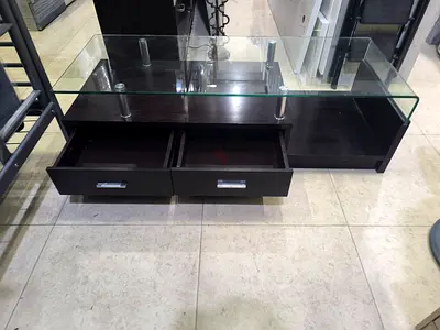 Modern glass-top TV stand with drawers - dark wood