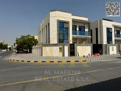 Corner villa, freehold, in one of Ajman's most prestigious areas, on a main street, price includes electricity, water, and air conditioning.