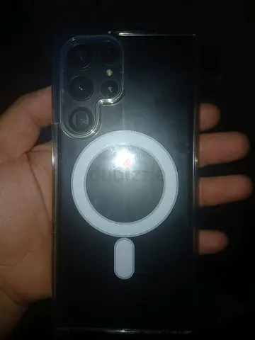 Samsung Galaxy smartphone with clear MagSafe-style case (used)