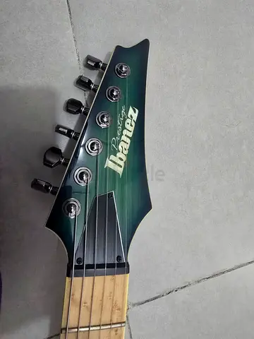 Teal electric guitar Ibanez including bag