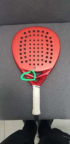 Used red Wilson padel racket - good condition