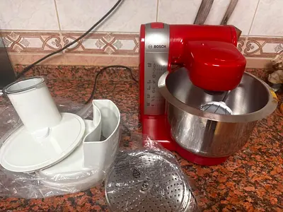 Bosch red stand mixer with bowl and attachments - good working condition
