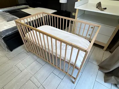 Ikea wood baby crib in good condition - natural finish
