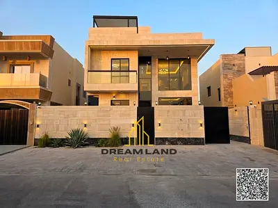 A distinctive villa for sale in Al Helio 2, Ajman, including registration and ownership fees. Close to services. Super deluxe finishing.