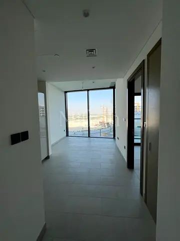 شقة بغرفة نوم واحدة في الطابق العلوي | إطلالات على البحيرة والمارينا | Hartland Waves Sobha Hartland