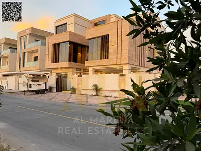 Turnkey villa with all fees included, on the main street, ready to move in, in the most prestigious area of Ajman, freehold ownership for all nation