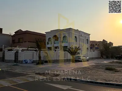 Luxury corner villa in Al Muwaihat 1, including electricity, water, and air conditioning, at a special price.