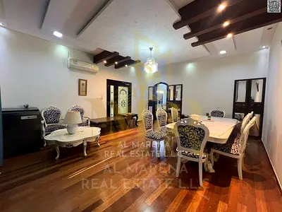 Villa in Al Rawda 1, corner lot on two streets, opposite a mosque. Modern design, close to all services, high-end finishing. Price includes electricit