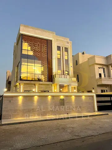 The epitome of luxury and privacy in Al-Aliya: a modern two-story villa with a rooftop terrace and private pool, all at a price including registration